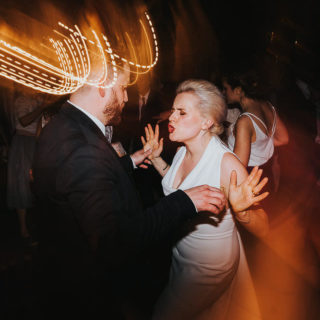 KENT WEDDING PHOTOGRAPHER BRIDE AND GROOM DANCING SHUTTER LAG LIGHTS