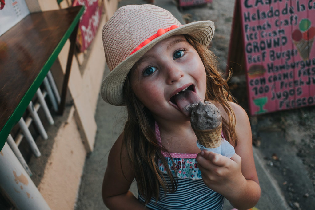 girl eating ice cream at playa samara costa rica wedding photographer