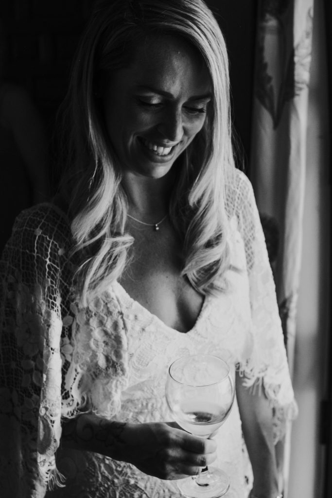 black and white portrait of bride near window jerez wedding photographer