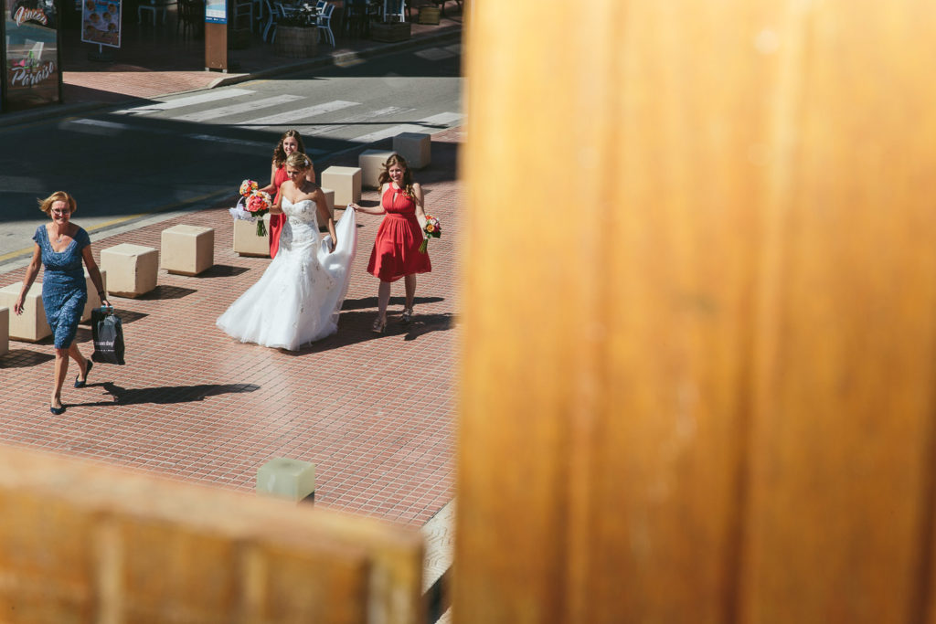 BRIDE AND BRIDESMAIDS WALKING SOL Y MAR CALPE COSTA BLANCA WEDDING PHOTOGRAPHER